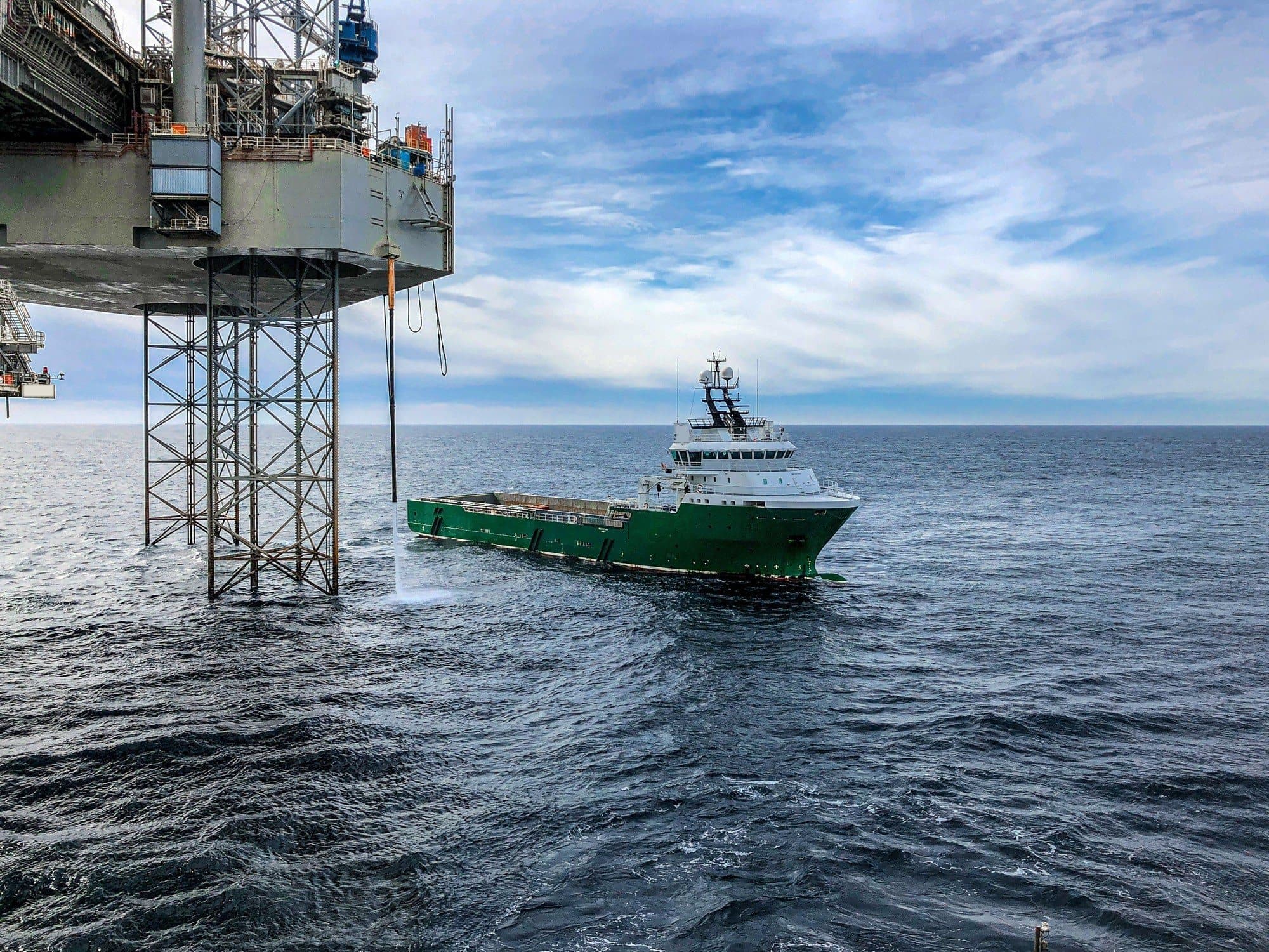Platform supply vessel working alongside an offshore installation